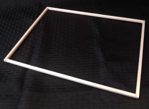 Four narrow pieces of balsa form a rectangular base.