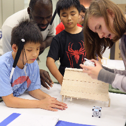 Three students and a teacher in an NFB EQ lesson.