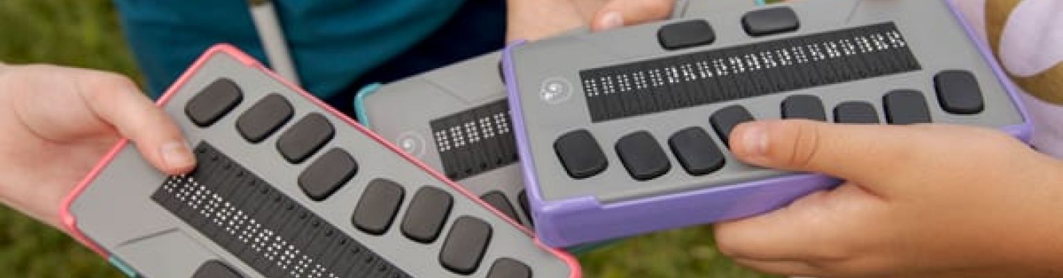 Three Chameleon 20 Braille displays with different bumper colors; photo courtesy of APH.