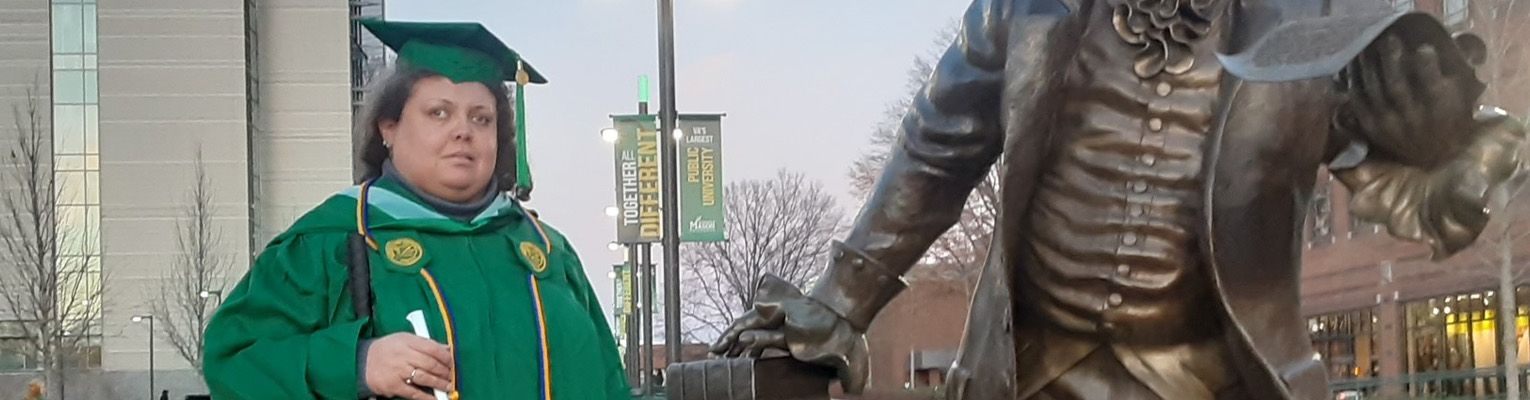 Marinela Ortiz in her cap and gown at her George Mason University graduation.